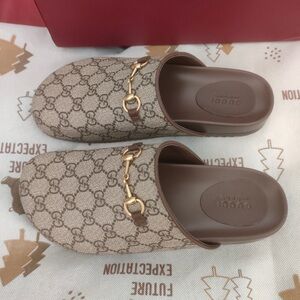 Gucci Women's Brown Monogram Mules